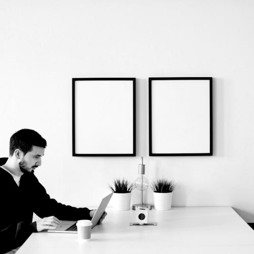 A man at a home office desk